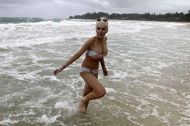 Lindsay Lohan exposing sexy body and hot ass in colorful bikini on beach #75279251