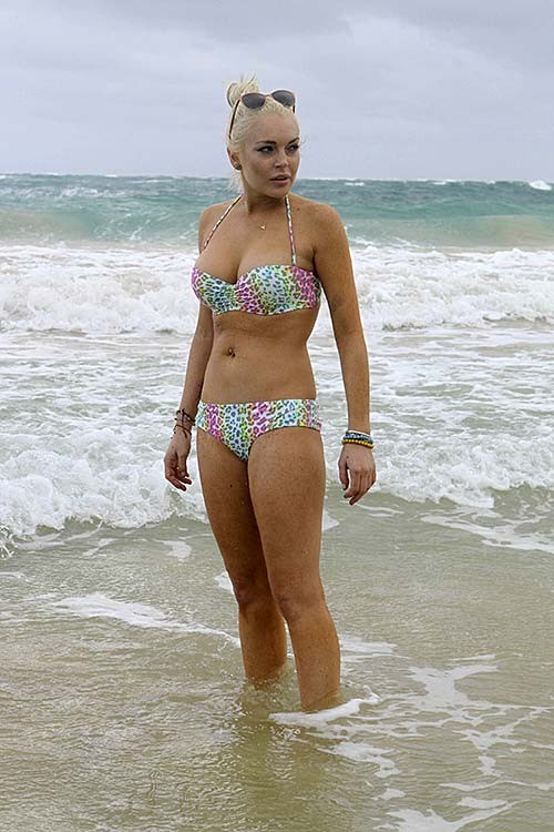 Lindsay Lohan exposing sexy body and hot ass in colorful bikini on beach #75279315