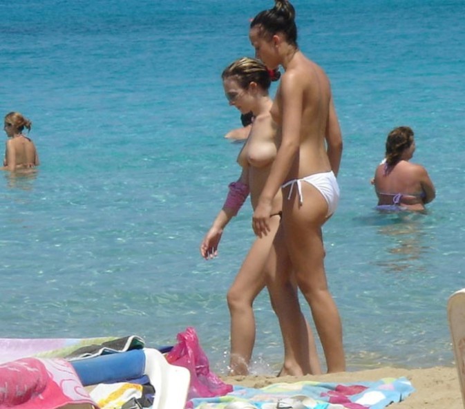 Barely authorized nudist babe lights up at the beach #72251832