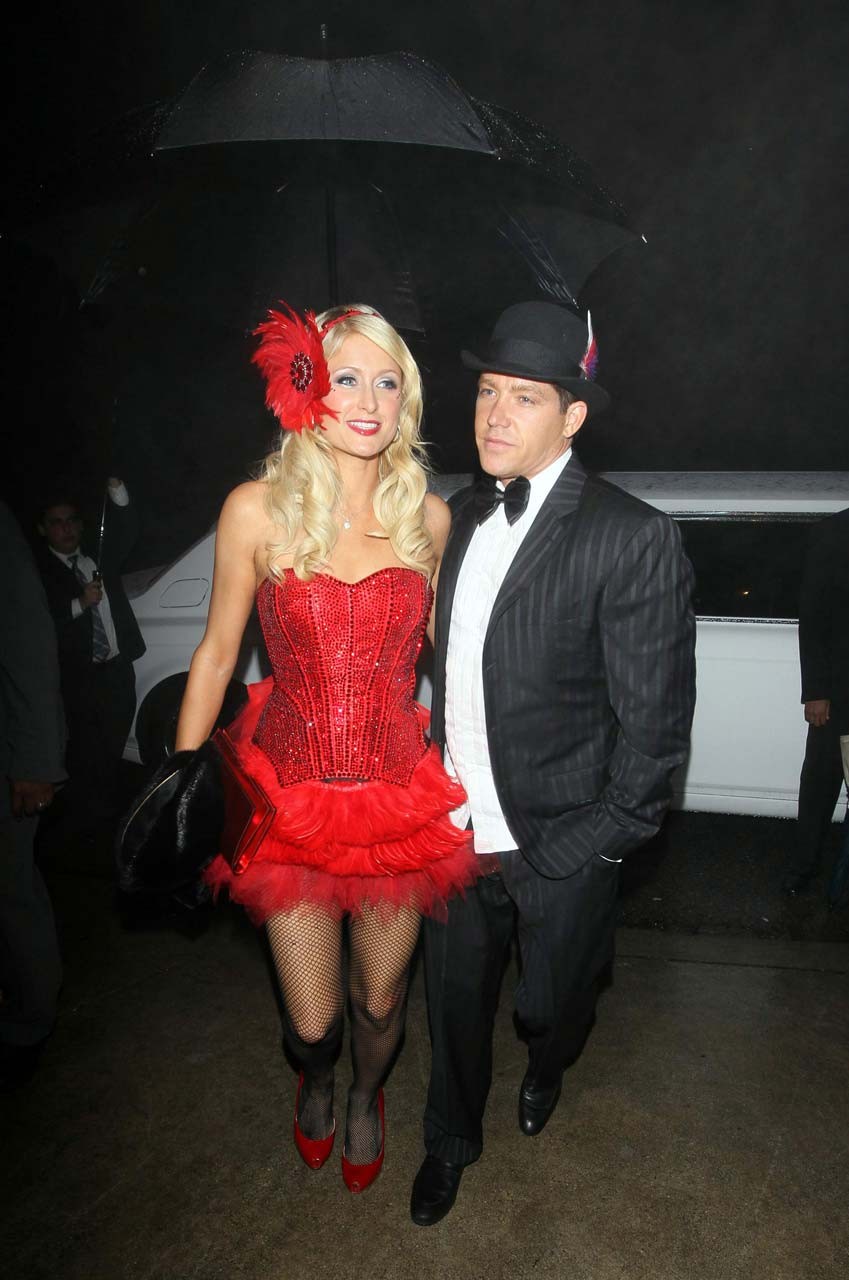 Paris Hilton looking very sexy and leggy in red mini skirt and fishnets stocking #75317325