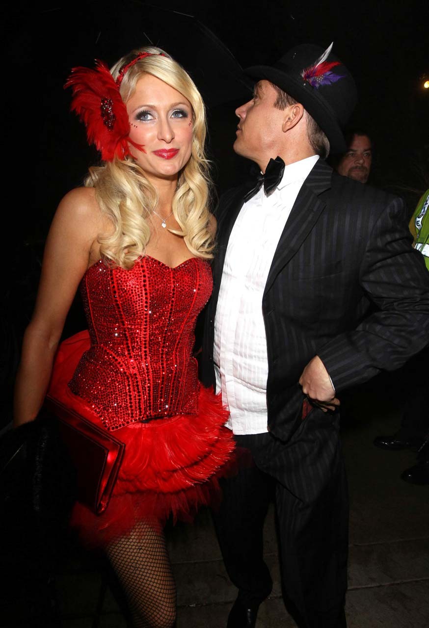 Paris Hilton looking very sexy and leggy in red mini skirt and fishnets stocking #75317327