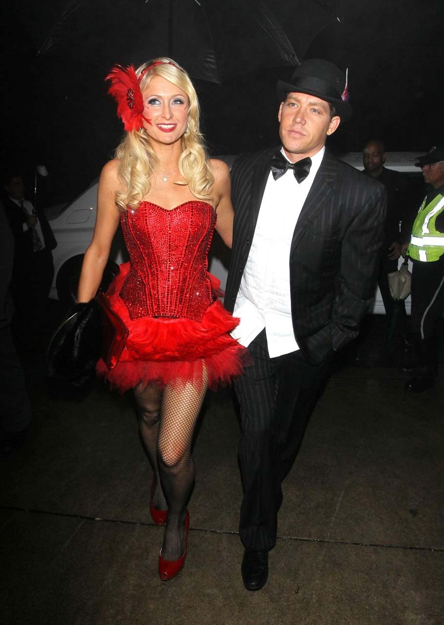 Paris Hilton looking very sexy and leggy in red mini skirt and fishnets stocking #75317335
