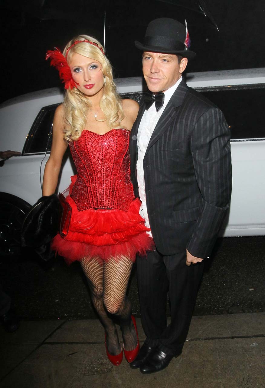 Paris Hilton looking very sexy and leggy in red mini skirt and fishnets stocking #75317381