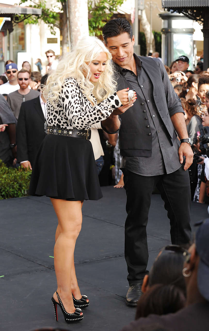 Christina Aguilera showing amazing legs in ultra short mini skirt #75301415