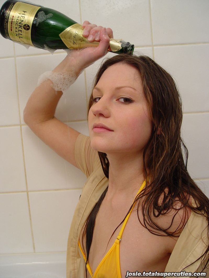Teen covered in champagne #79049587