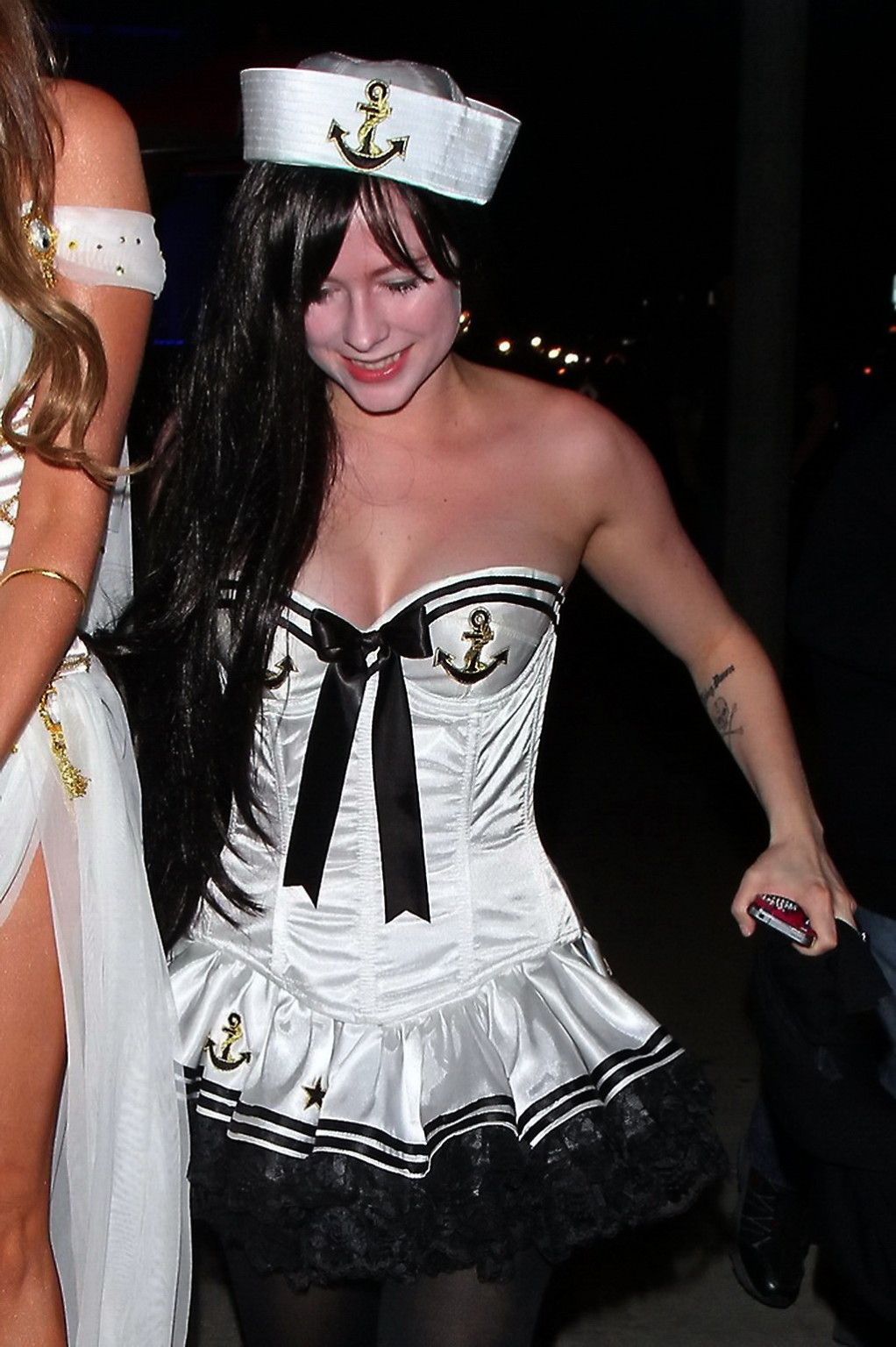 Avril Lavigne wearing a sexy sailor costume outside the BOA Steakhouse in Beverl #75249665