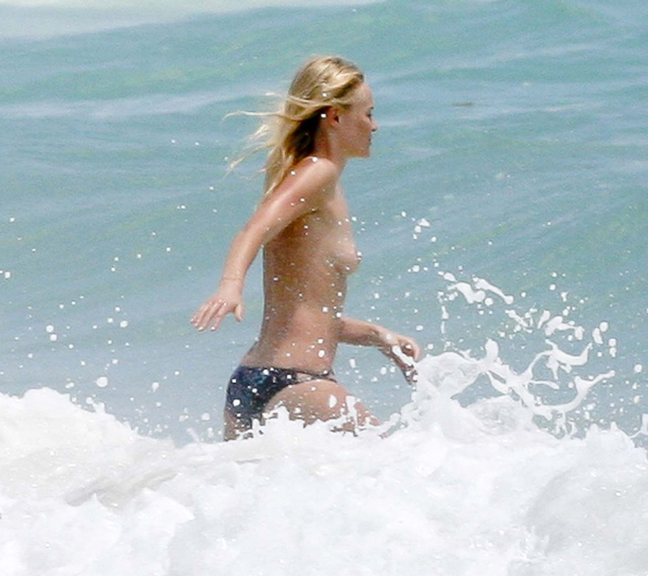 Kate Bosworth exposing her nice big boobs and playing on beach paparazzi picture #75308496