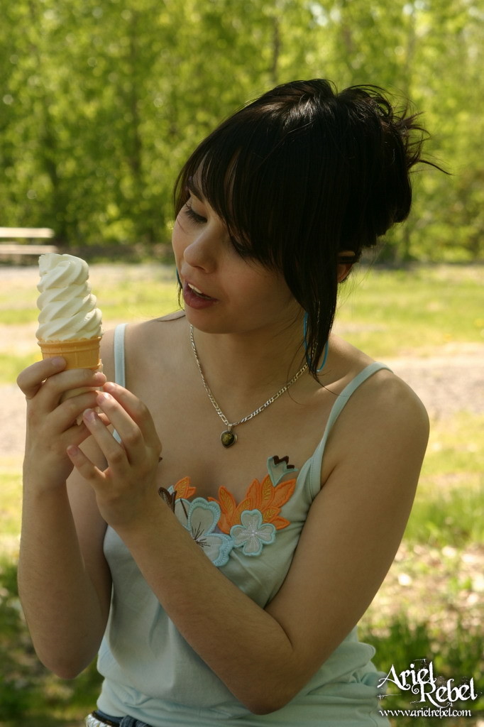 Teen licks ice cream