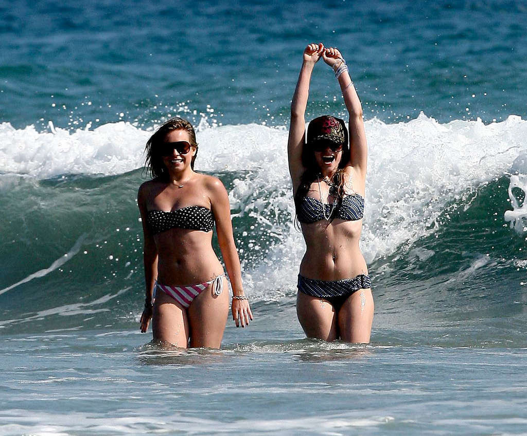 Avril Lavigne enjoying on beach with her friend and showing sexy body #75375509