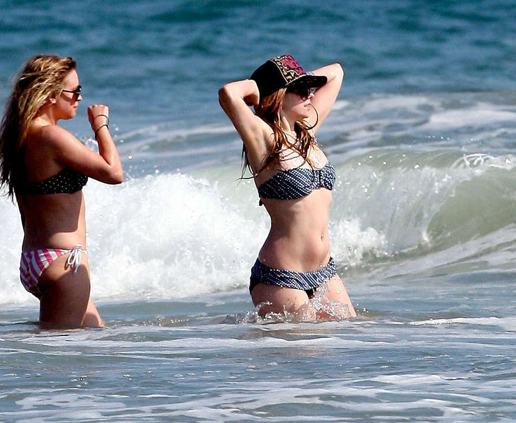 Avril Lavigne enjoying on beach with her friend and showing sexy body #75375528