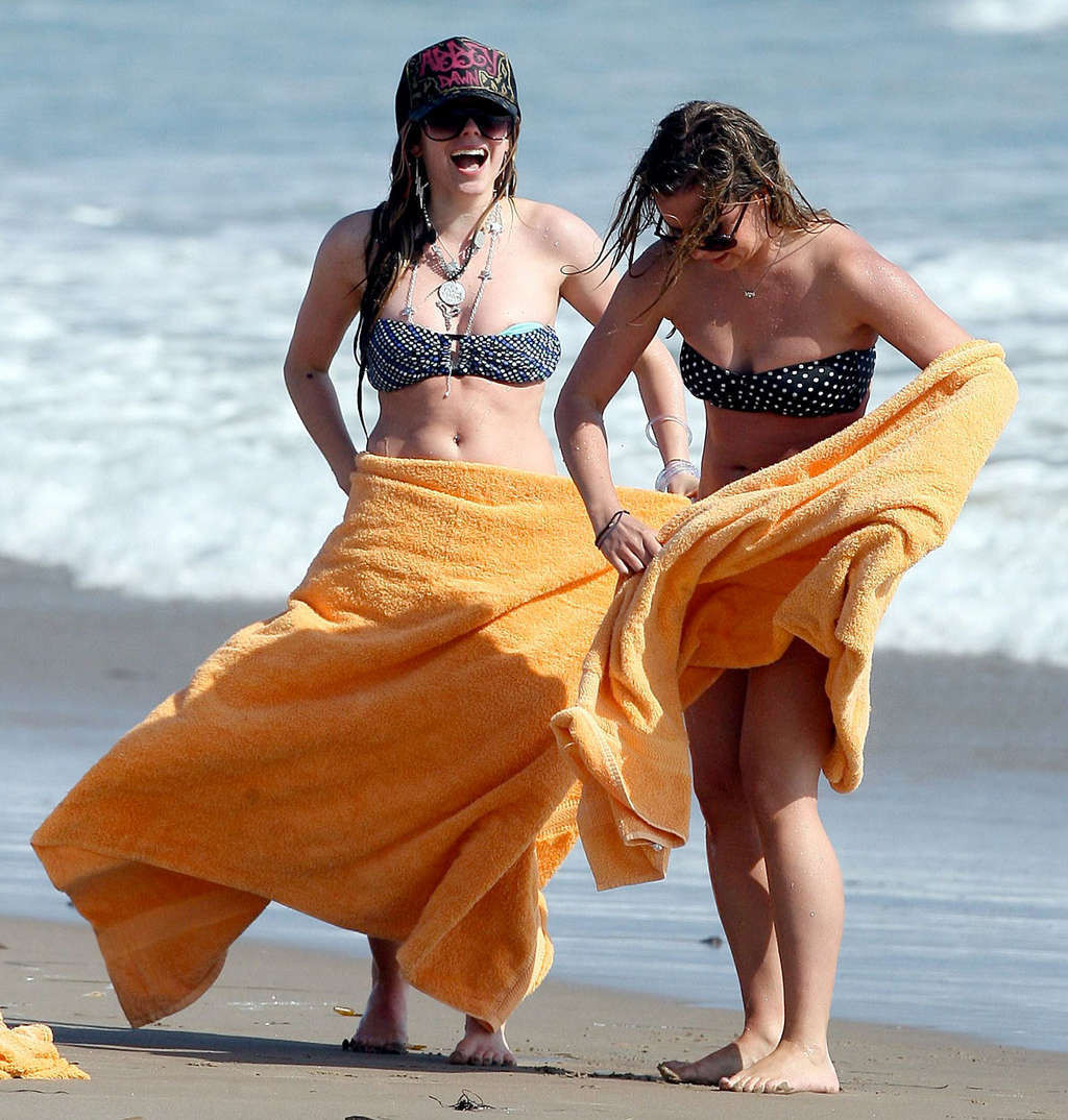 Avril Lavigne enjoying on beach with her friend and showing sexy body #75375629