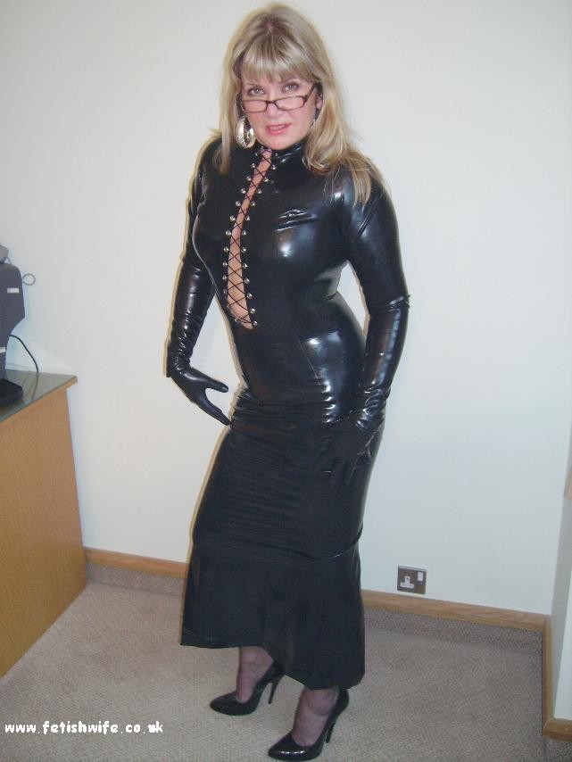 Fetish housewife in tight latex dress #76562751