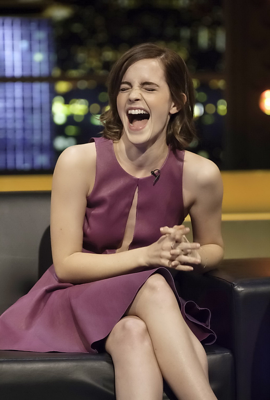Emma Watson leggy shows cleavage in a short low cut leather dress on the Jonatha #75251897