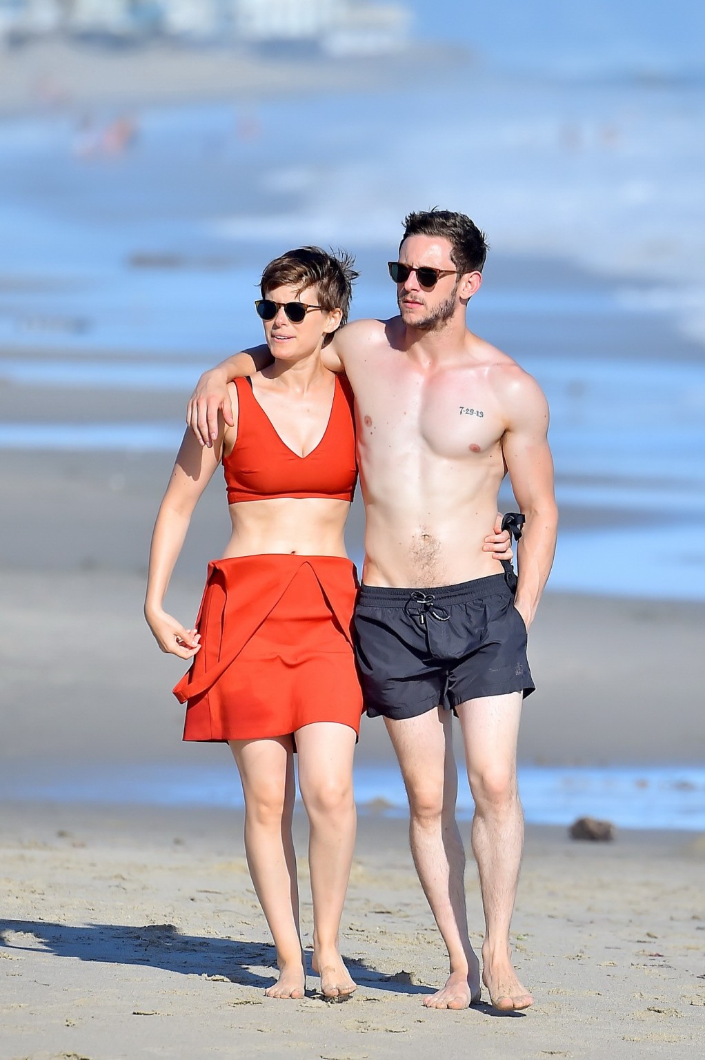 Kate Mara busty in belly top and mini skirt at the beach #75153086