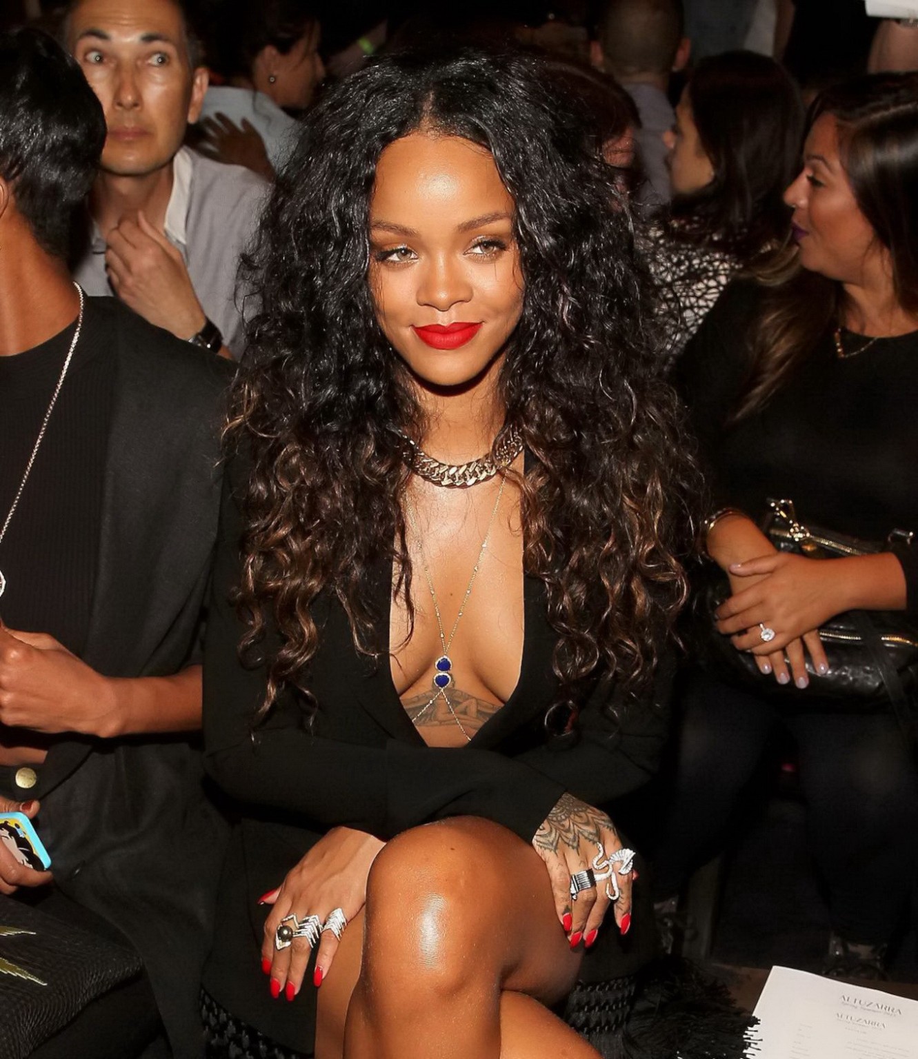 Rihanna cleavy and flashing her panties in a wide open black mini dress at the f #75186323