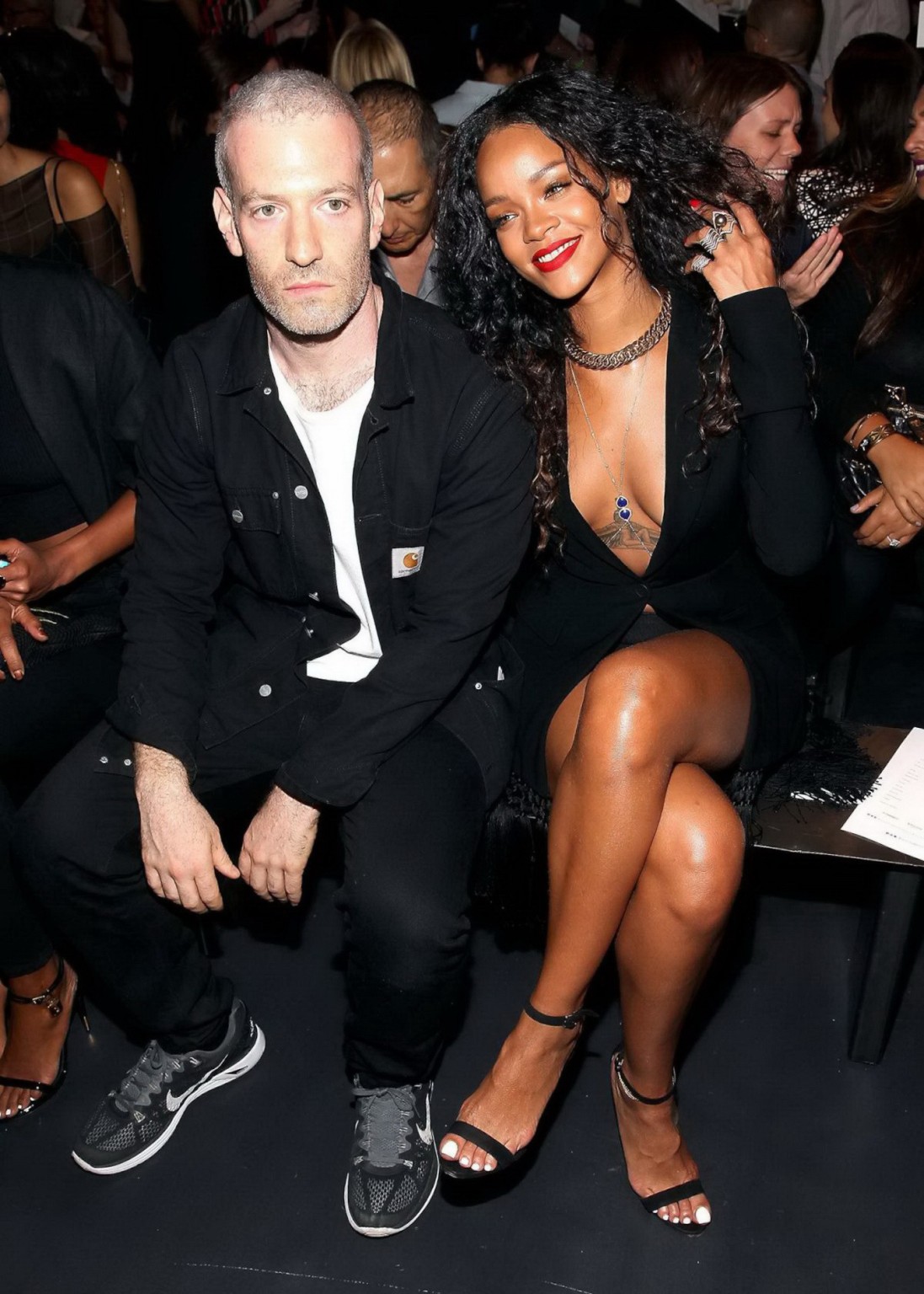 Rihanna cleavy and flashing her panties in a wide open black mini dress at the f #75186376