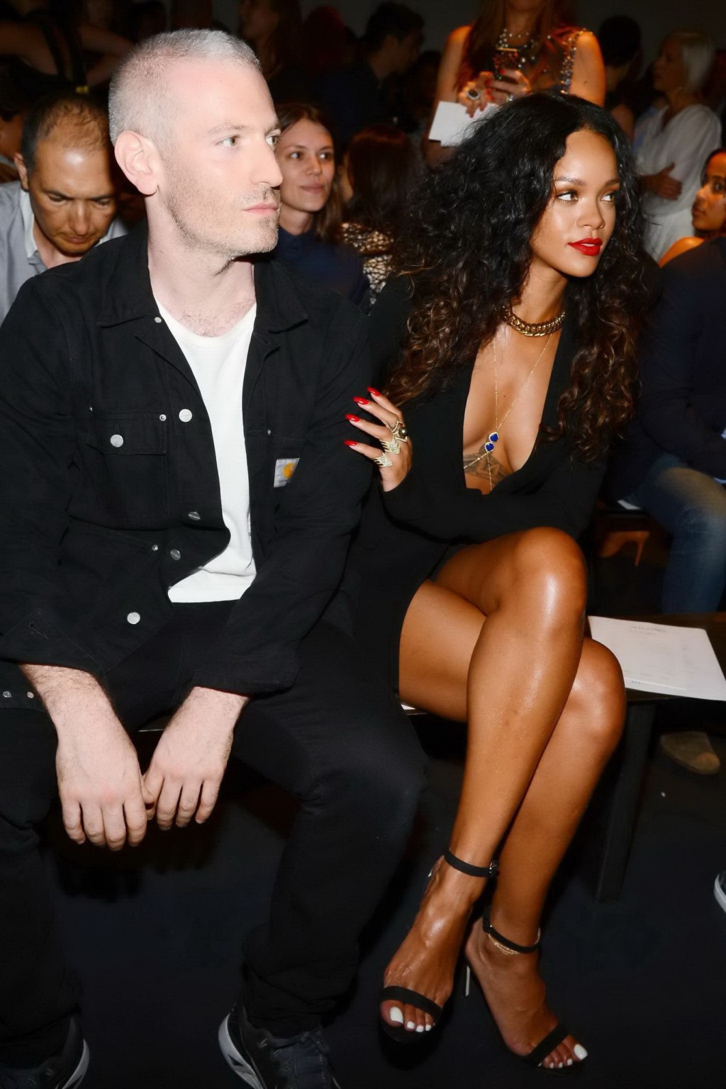 Rihanna cleavy and flashing her panties in a wide open black mini dress at the f #75186381
