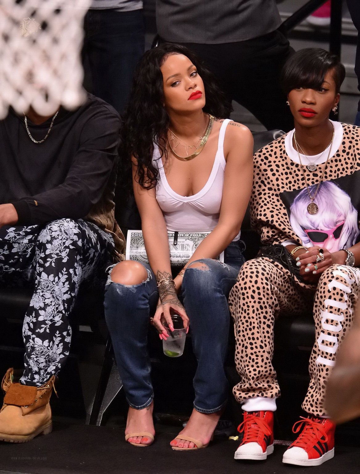 Rihanna shows off her boobs in seethru top at a basketball game in NYC #75198000