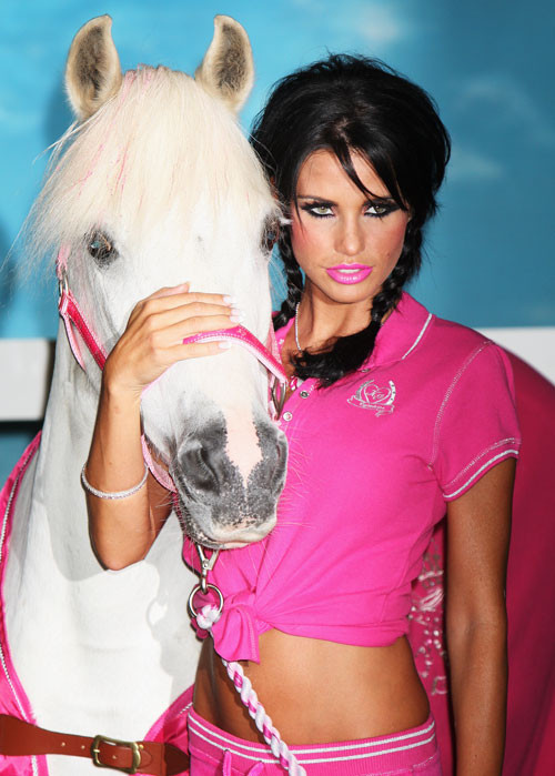 Katie Price Jordan posing with horse and show tits #75413522