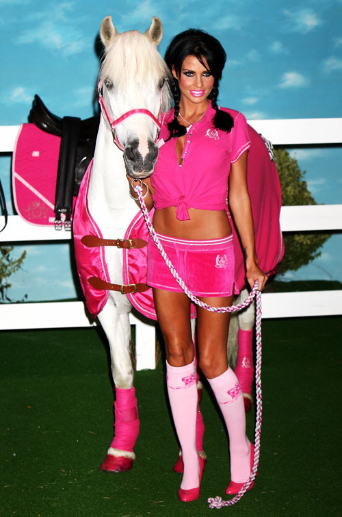 Katie Price Jordan posing with horse and show tits #75413539