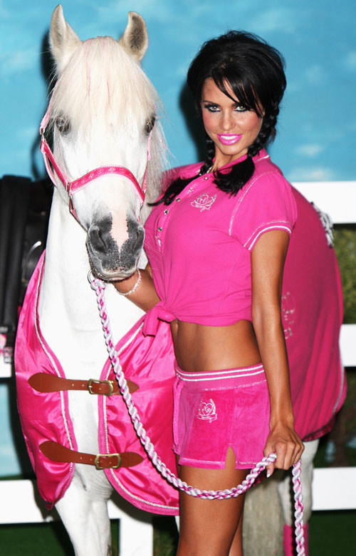 Katie Price Jordan posing with horse and show tits #75413549