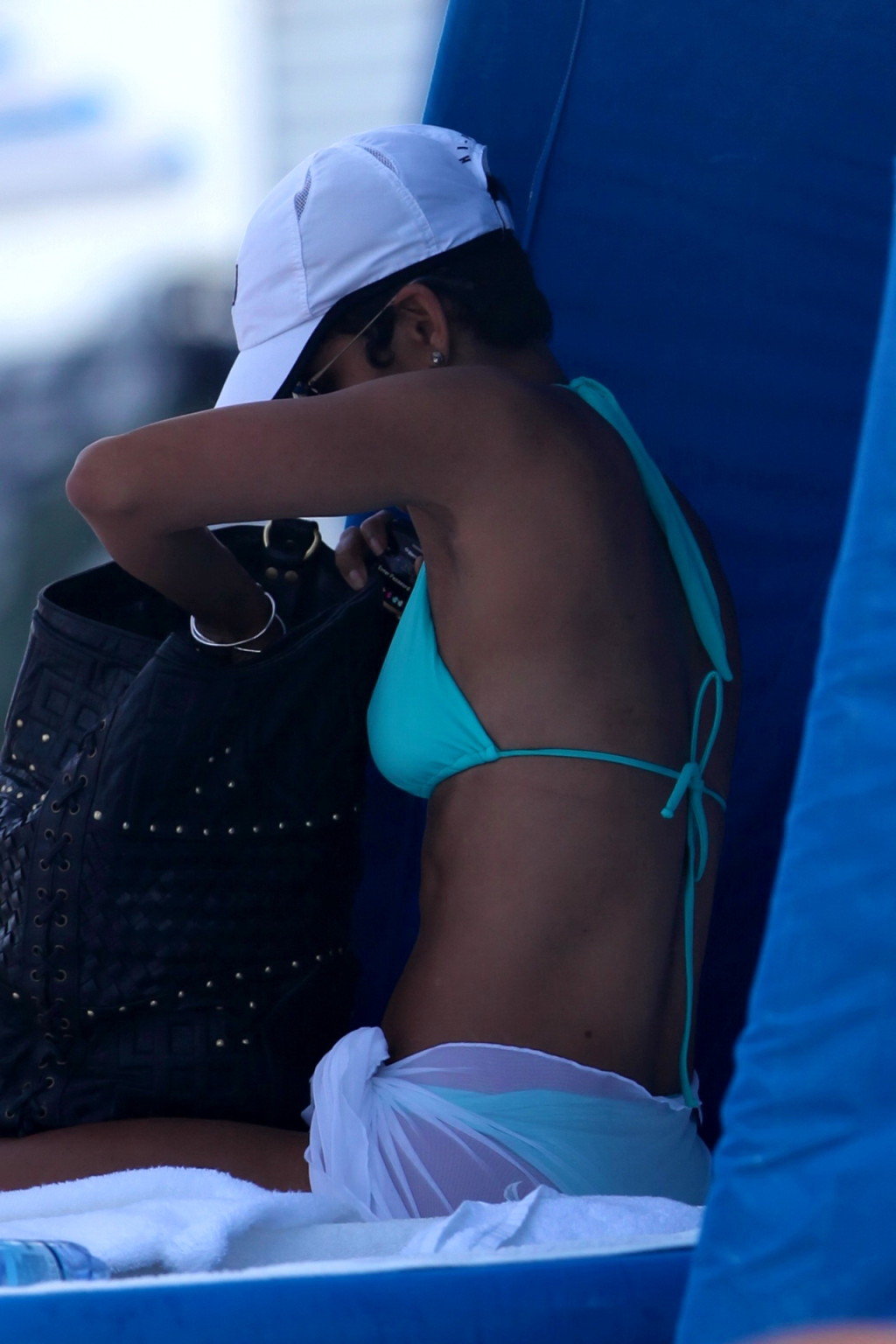 Busty Halle Berry wearing tiny blue bikini on the beach #75347354