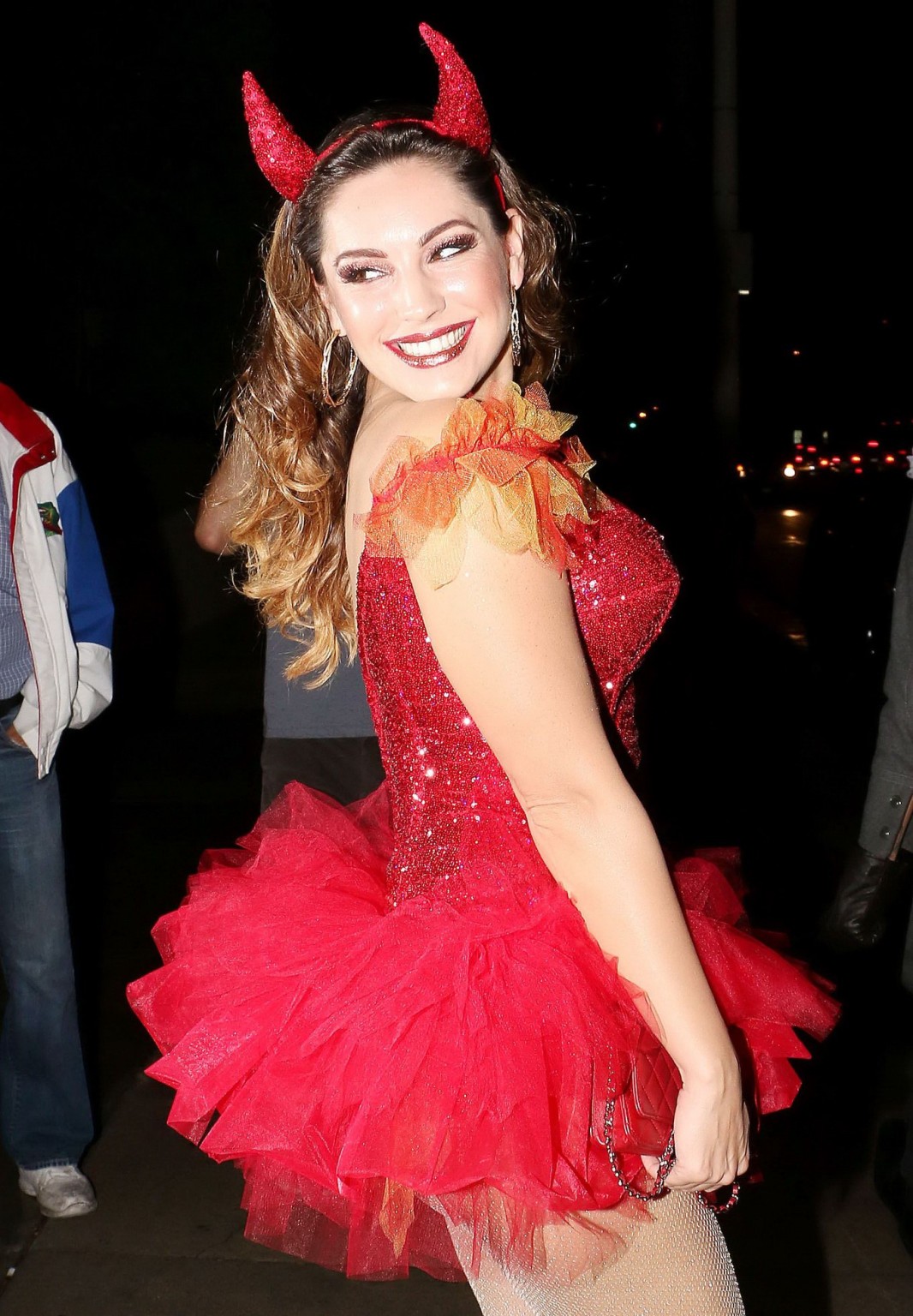Kelly Brook busty and leggy in tiny red devil costume and stockings at Halloween #75182393
