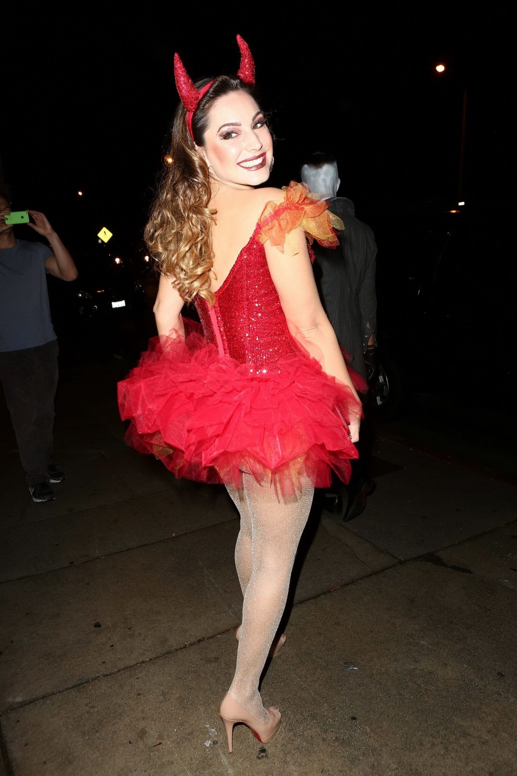 Kelly Brook busty and leggy in tiny red devil costume and stockings at Halloween #75182409