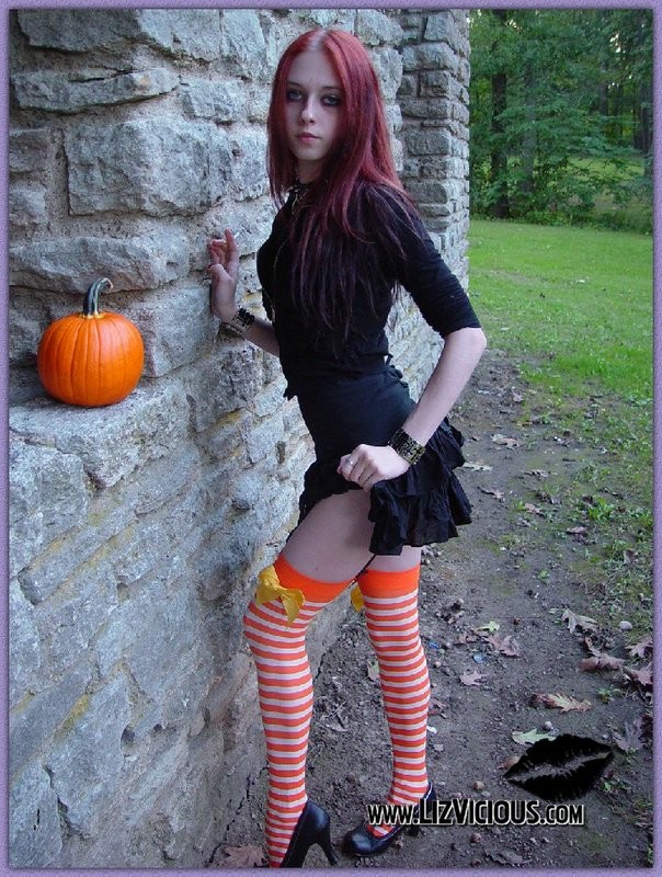 Hot gothic babe Liz plays with a pumpkin #70603977