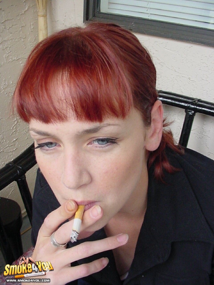 Cassandra steps outside to lazily smoke her cigarettes #76575360