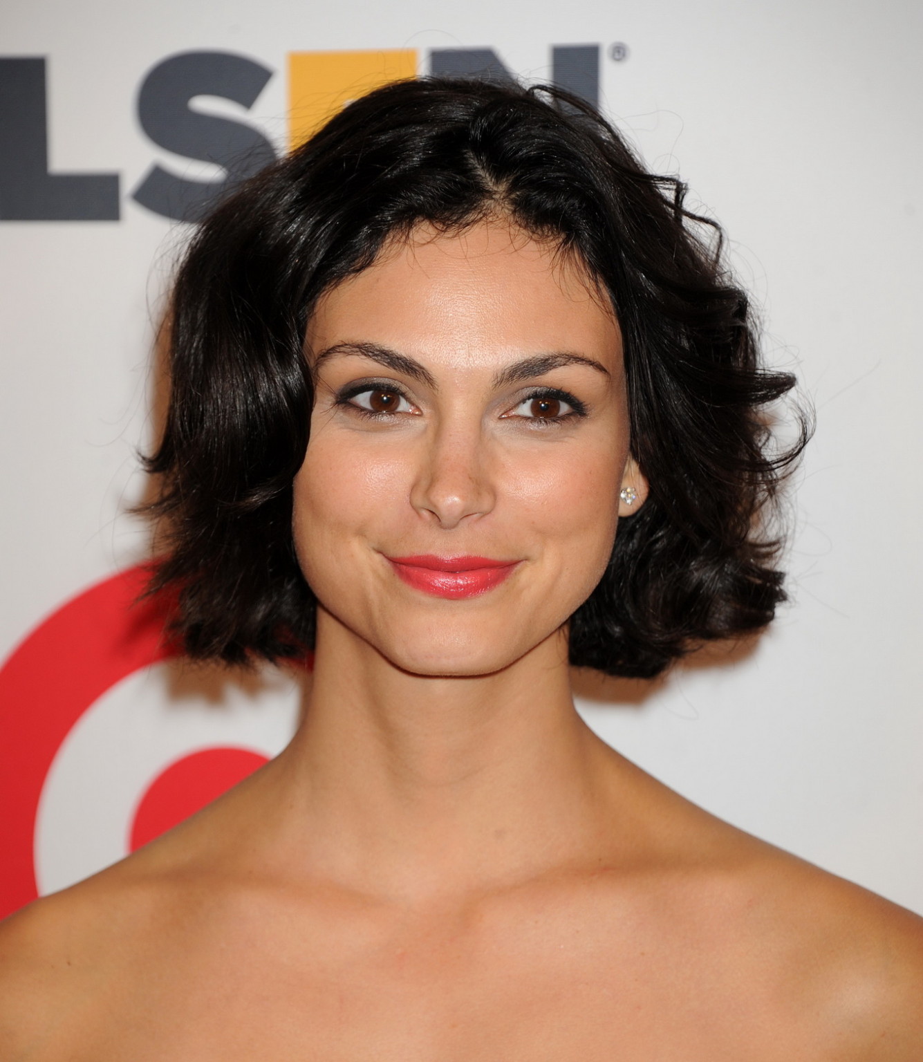 Morena Baccarin busty wearing a strapless black dress at the 10th Annual GLSEN R #75183627