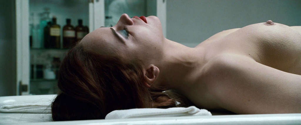 Christina Ricci reveals her nice small tits while lie on desk in movie #75338388