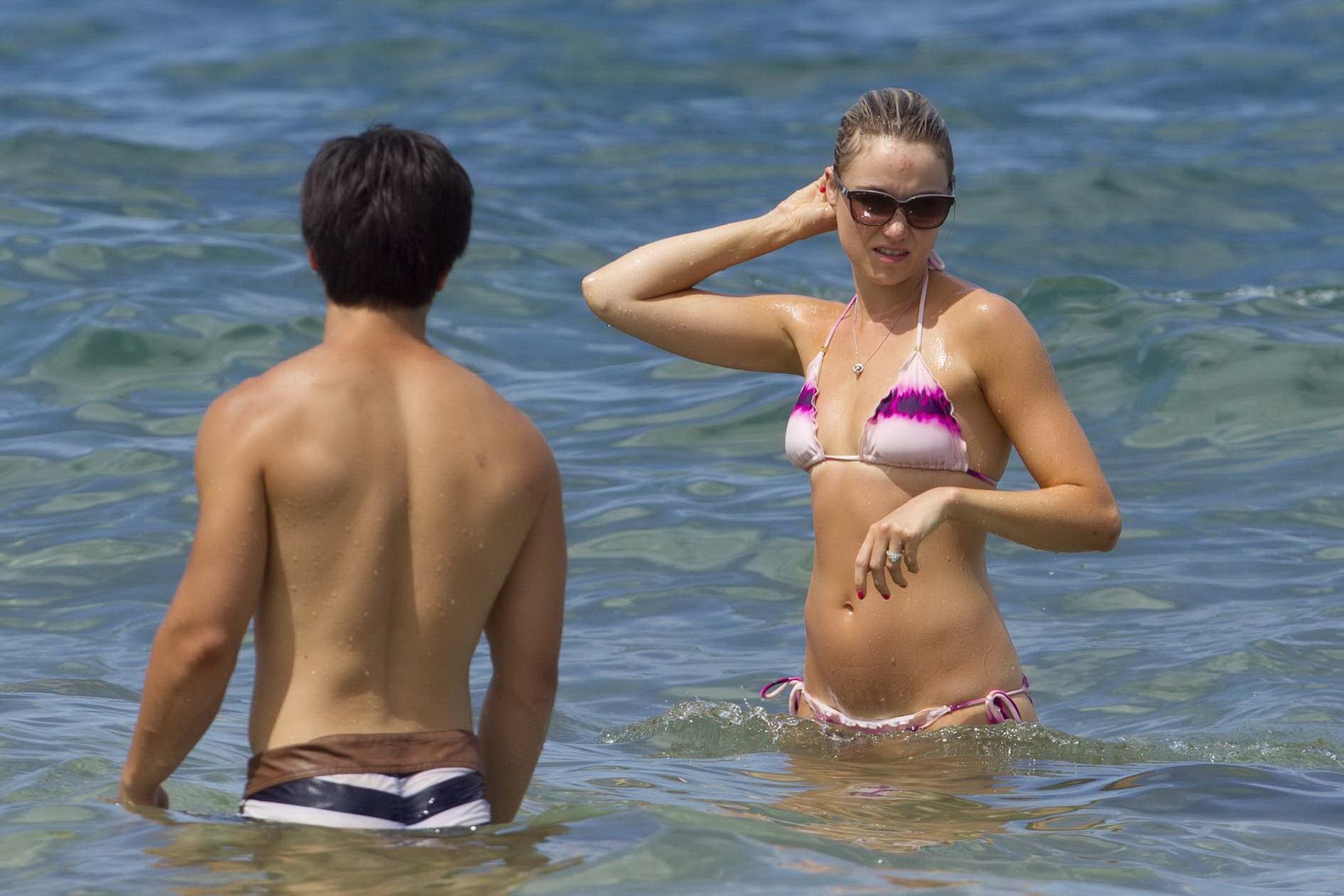 Katrina Bowden wearing tiny wet pink print bikini at the beach in Hawaii #75218696