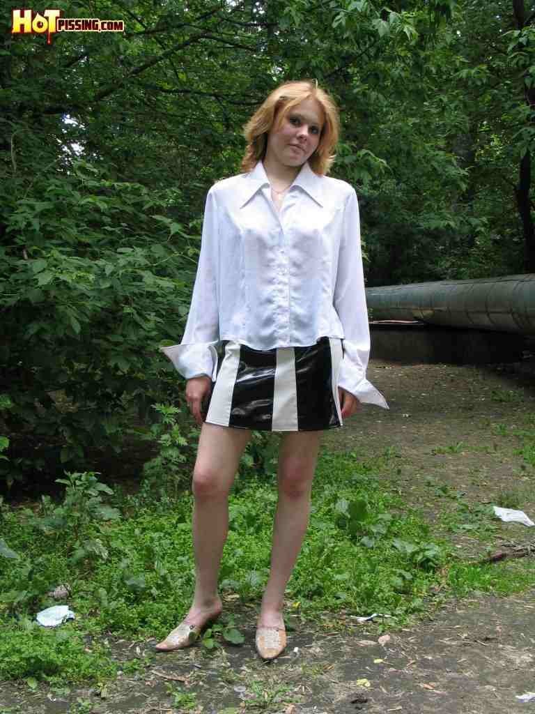 Cutie pissing outdoors #76593171