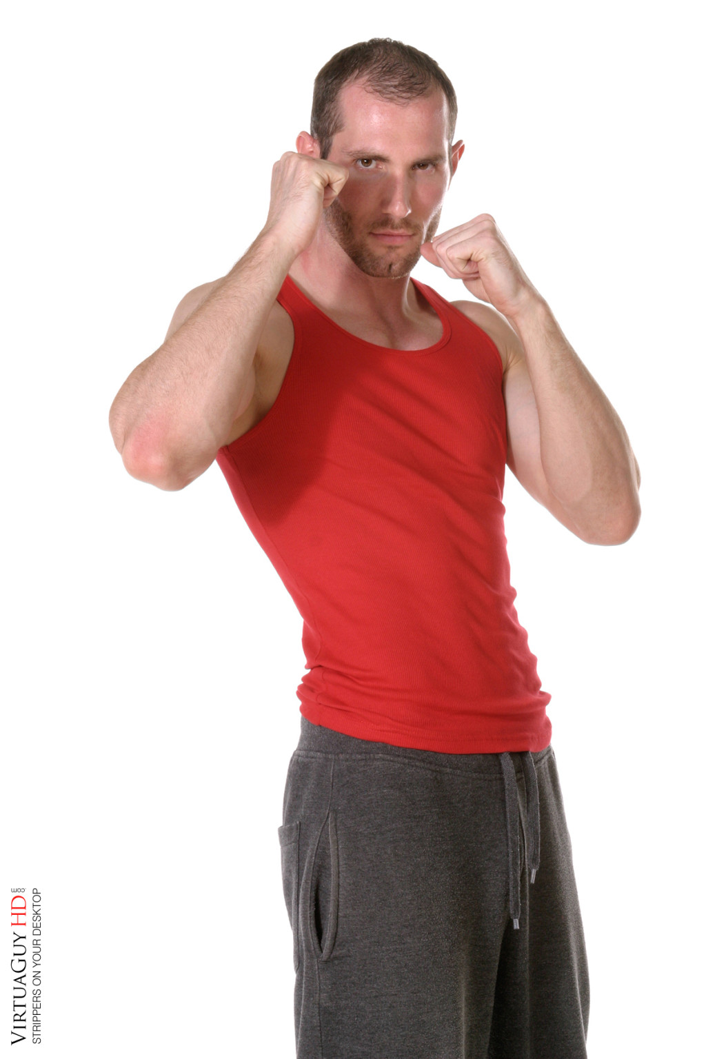 Un guapo boxeador muestra su cuerpo musculoso
 #76980567