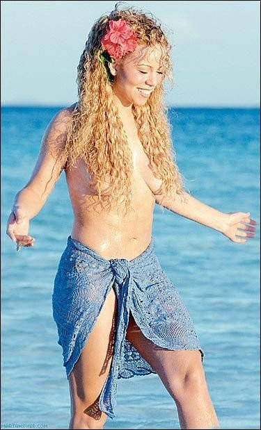 Mariah carey en transparente et jupe haute, photos de castor
 #75419033
