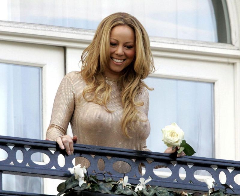 Mariah carey en transparente et jupe haute, photos de castor
 #75419051