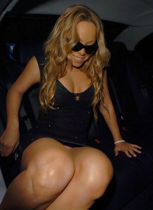 Mariah carey en transparente et jupe haute, photos de castor
 #75419080