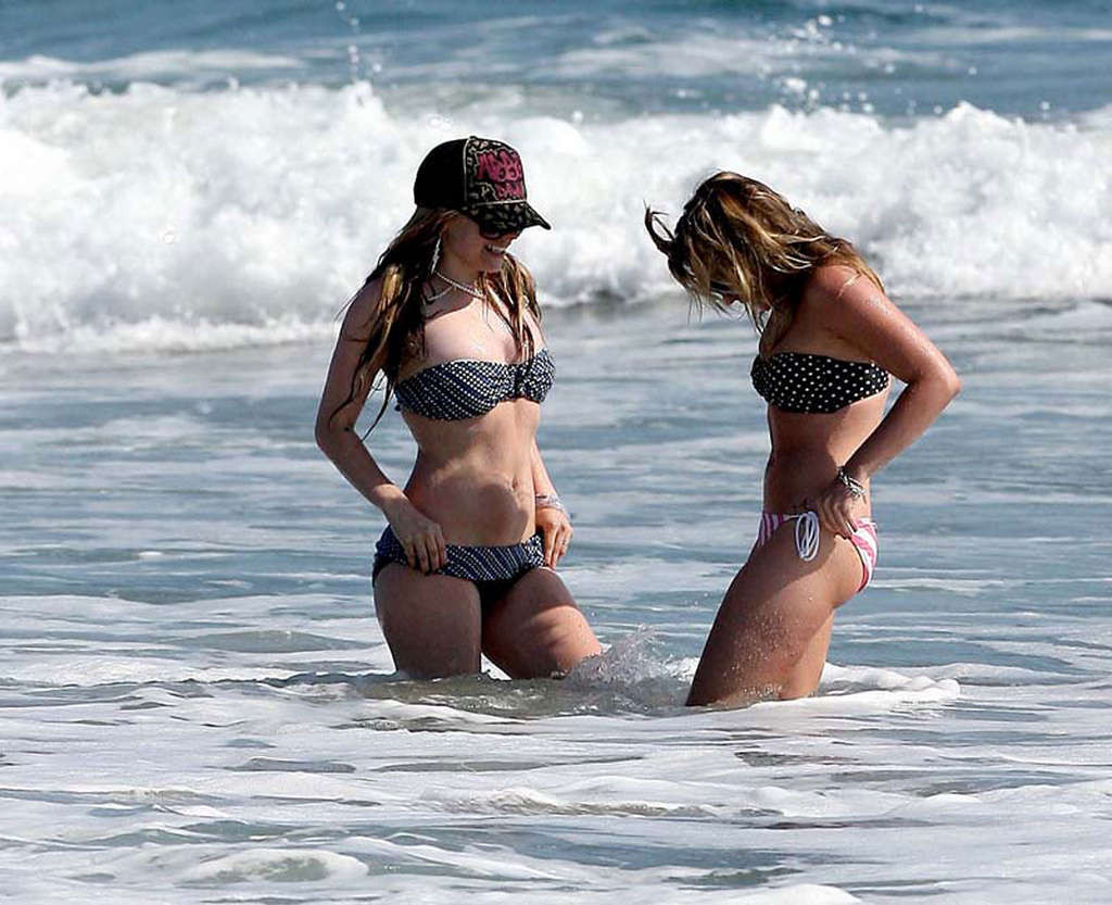 Avril Lavigne showing her sexy body and hot ass in bikini on beach #75356064