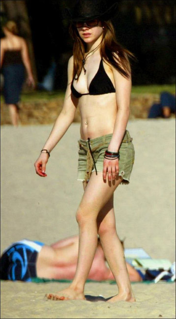 Avril Lavigne shows her perky tit
 #75443619