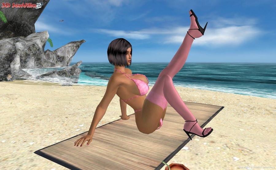 Une jeune femme en bikini bien roulée se fait sucer les pieds à la plage.
 #67055241