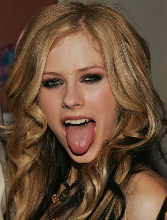 Avril Lavigne caught with her nipple exposed #75366789