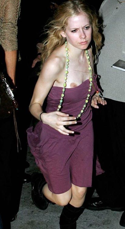 Avril Lavigne caught with her nipple exposed #75366793