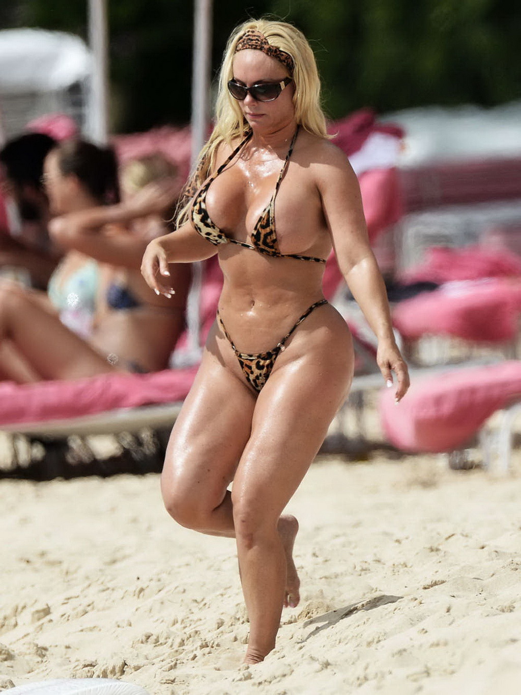 Nicole Coco Austin areola peek in a thong lepard print bikini at a beach in Barb #75186545