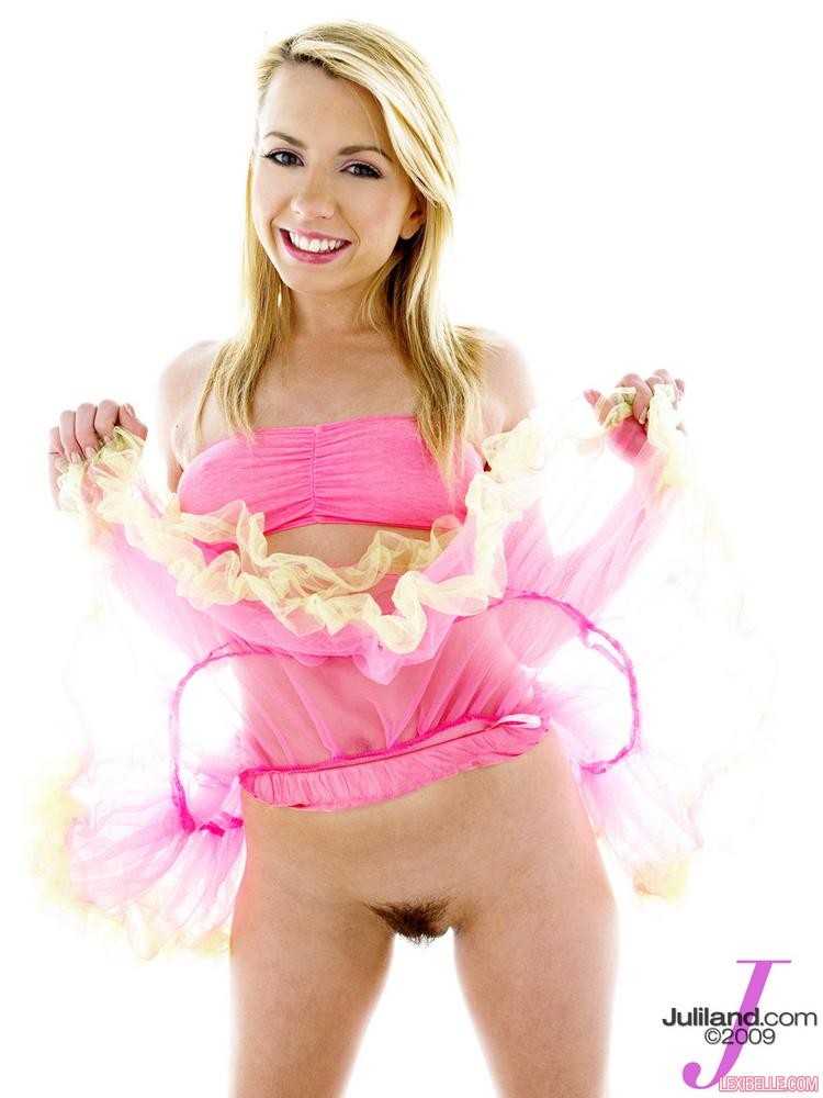 Lexi Belle posing in a pink boob tube and skirt #78860409