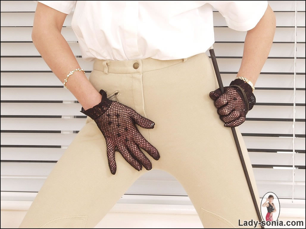 Stunning riding mistress in skintight riding jodhpurs and boots #72001486