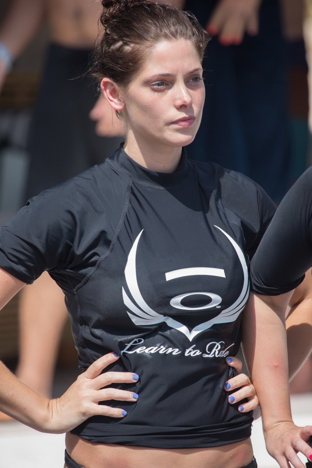 Ashley Greene wearing black bikini while surfing at the Oakley Learn To Surf Eve #75228215