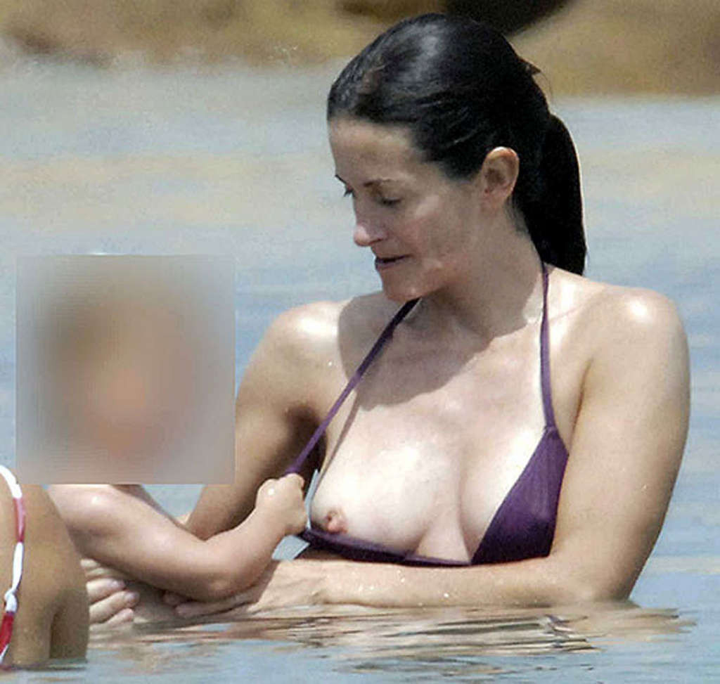 Courteney Cox very leggy in mini skirt and tits slip in water #75359636