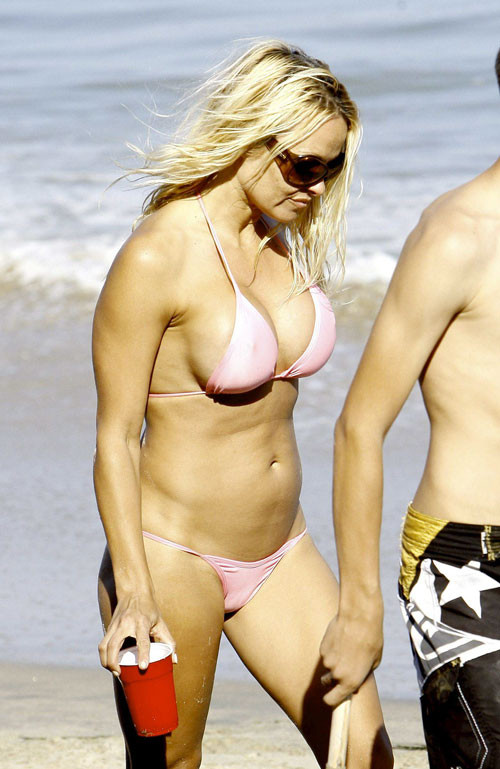 Pamela Anderson looking very sexy in bikini paparazzi pictures and show pussy an #75394940