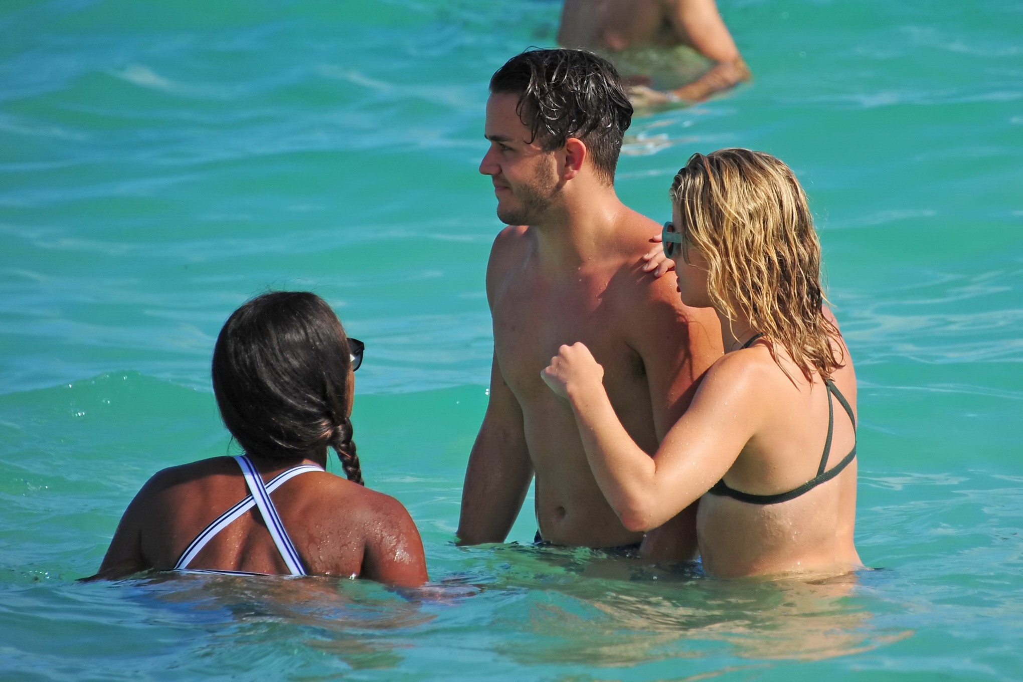 Emily Bett Rickards wearing tiny green bikini at the beach #75147999